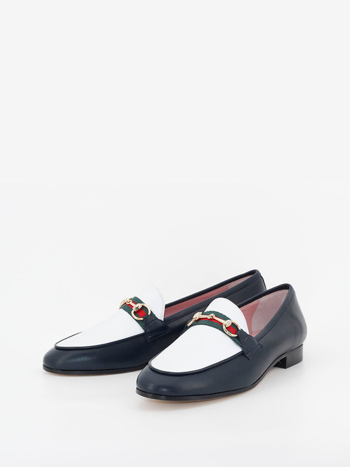 Taormina navy leather loafers with white topknot 